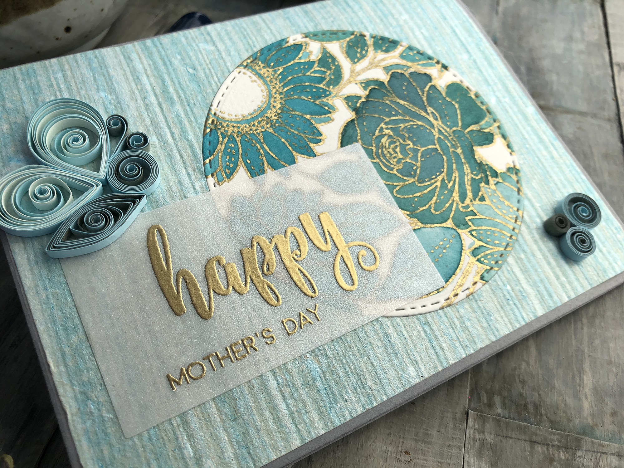 Close-up of quilled butterfly and mother's day sentiment on handmade card